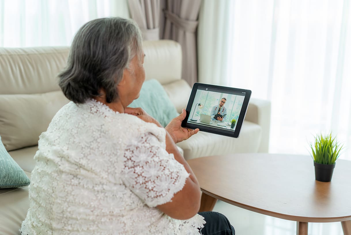 Older woman using technology