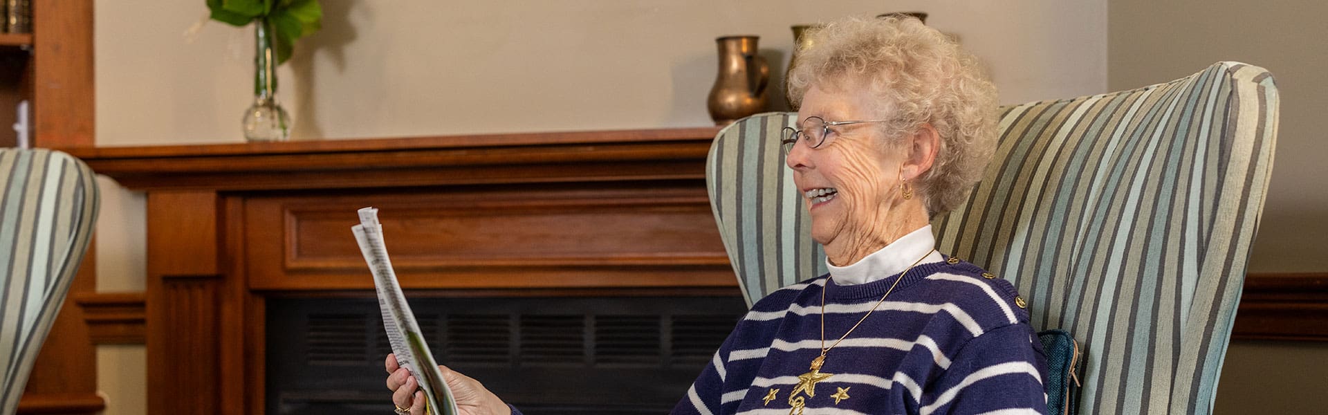 Senior woman reading the newspaper