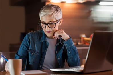 Senior woman using her laptop