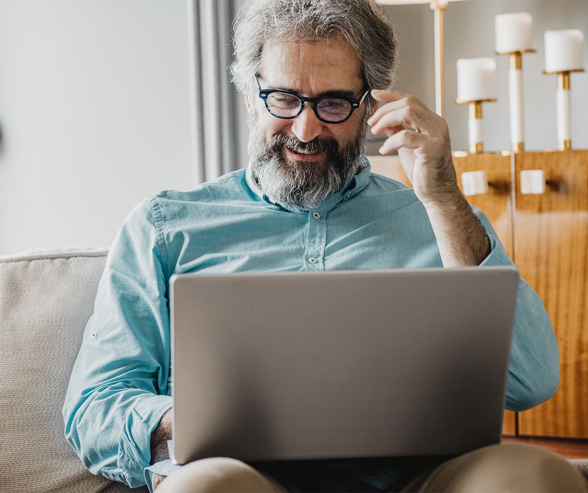 Older gentleman on laptop