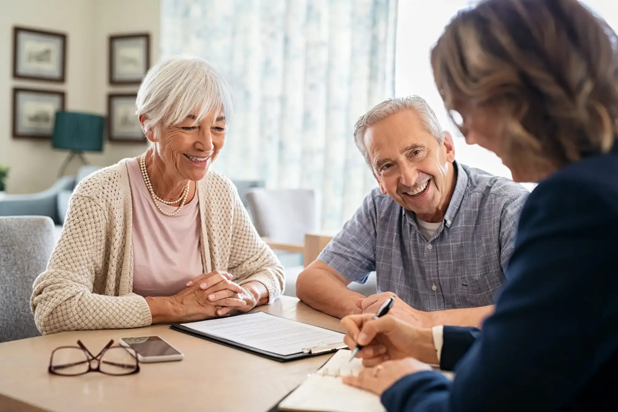 Senior couple learning about ccrc contract types from expert at StoneRidge in Mystic, CT.
