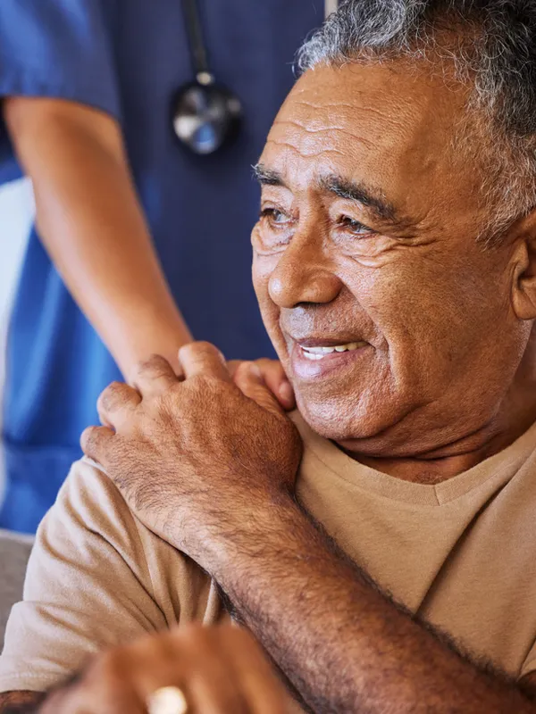 Respite care patient being comforted by a caregiver